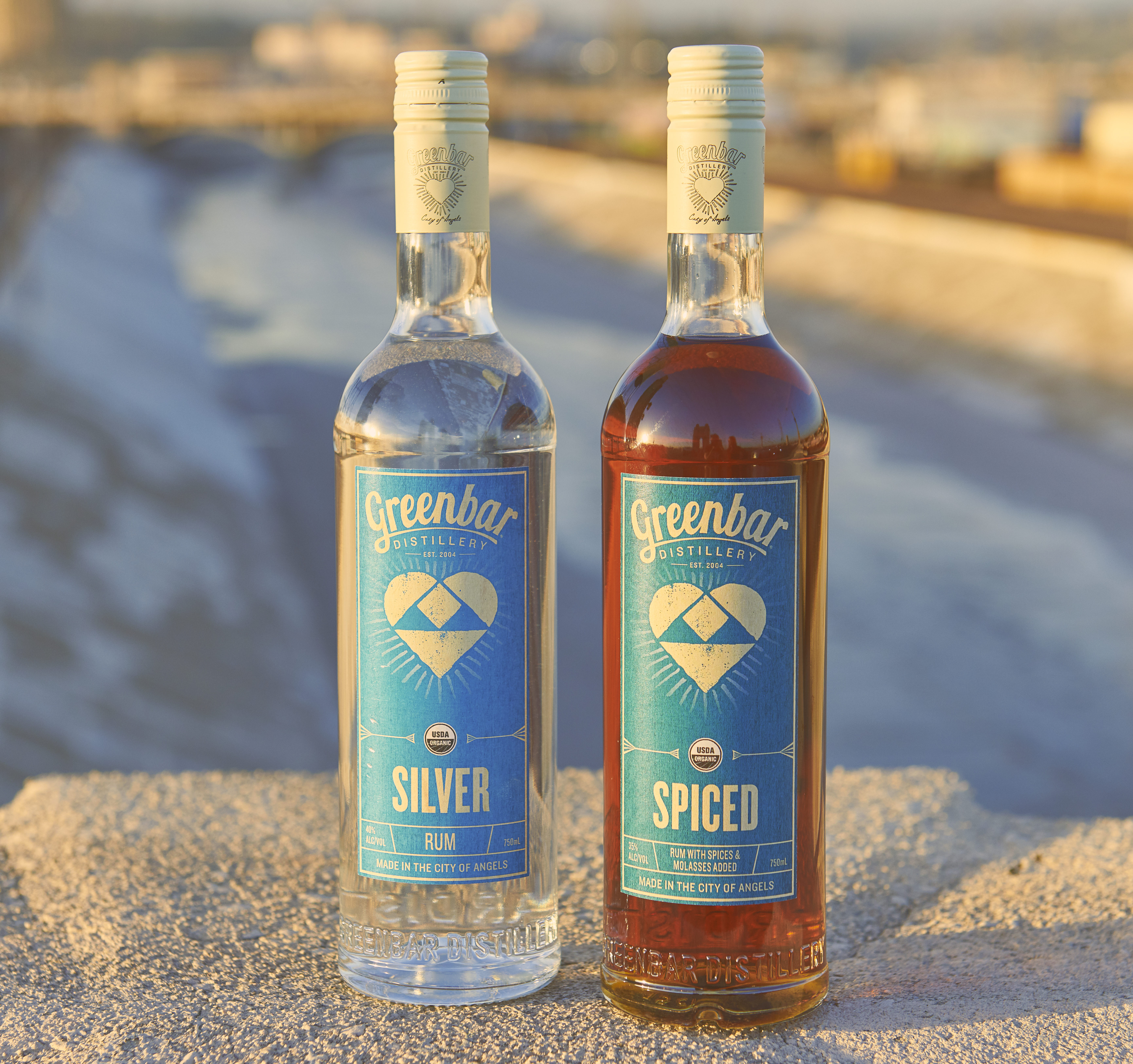 Greenbar Distillery silver and spiced rum bottles